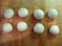 divided dough balls, ready to be rolled out